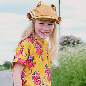 Child wearing Little Hotdog Watson tropical cinnamon baseball sun hat