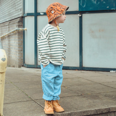 Kid wearing tiger print sun bucket hat (Image #4)