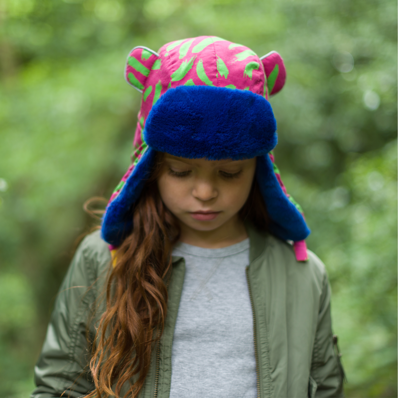 kid wearing a tiger print hat from Little Hotdog Watson (Image #7)