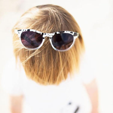 Child wearing Little Hotdog Watson sunglasses in panda pop (Image #7)
