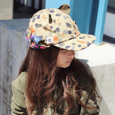 Kid wearing leopard print sun hat (Image #9)